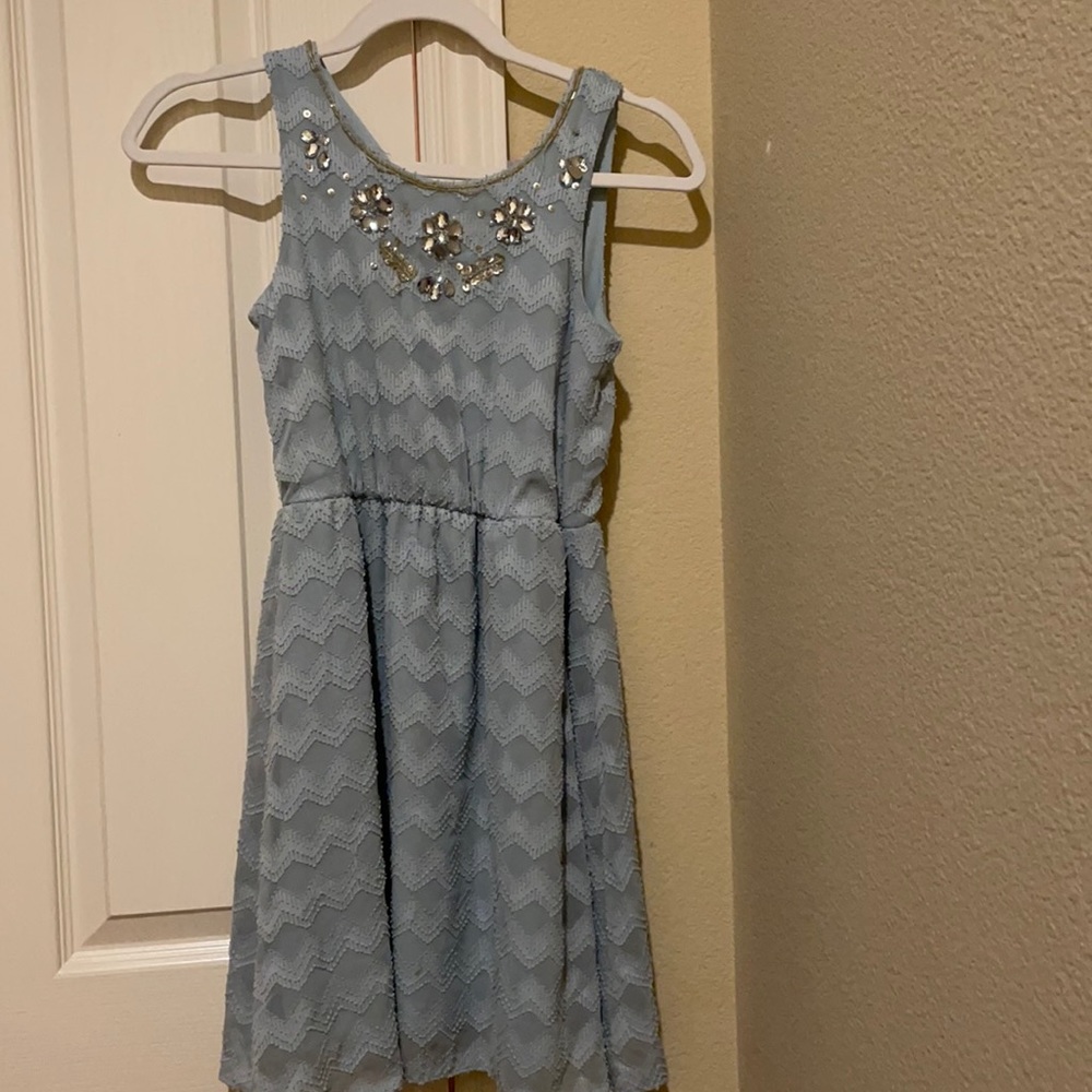 Pretty blue dress with jewel flowers